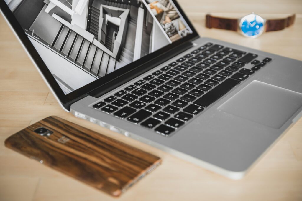 Workspace with design layouts representing portfolio and personal design works.